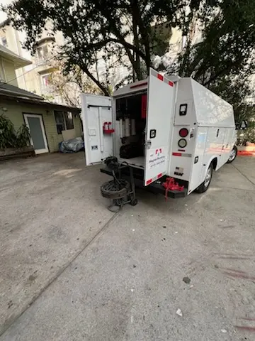 Magnet Plumbing service vehicle on-site for Grease Trap Cleaning in Coquina Ridge Mobile Homes